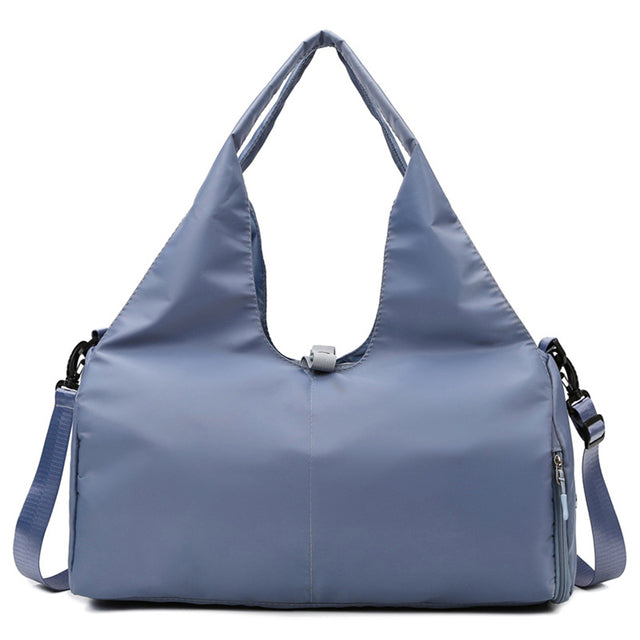 Blue fitness travel bag for women with wet pocket and yoga strap