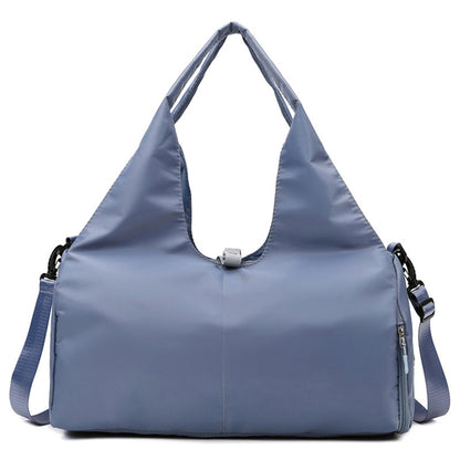 Blue fitness travel bag for women with wet pocket and yoga strap